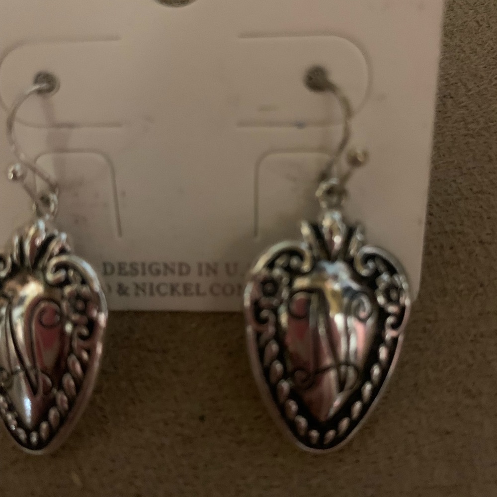 New earrings with “N” initials